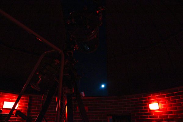 NIU’s Observatory’s telescope sits pointed at the moon. The Observatory owns a 14-inch Schmidt-Cassegrain telescope which is over 25 years old. (Ethan Rodriguez | Northern Star)