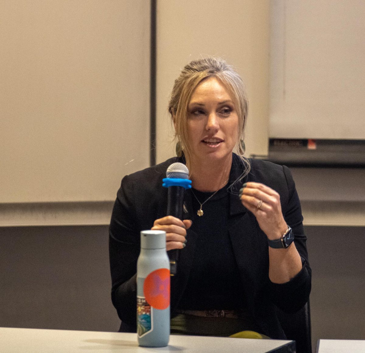 Kristy Schomaker, a digital services commercialization leader at Trane Commercial, sits at a table and speaks during the AI and Machine Learning panel discussion as part of the Engineering Showcase on Nov. 15 in the Engineering Building. Opinion Columnist Lalita Rai believes that women entering the STEM field should advocate for themselves and not feel outside pressure from men. (Tim Dodge | Northern Star)