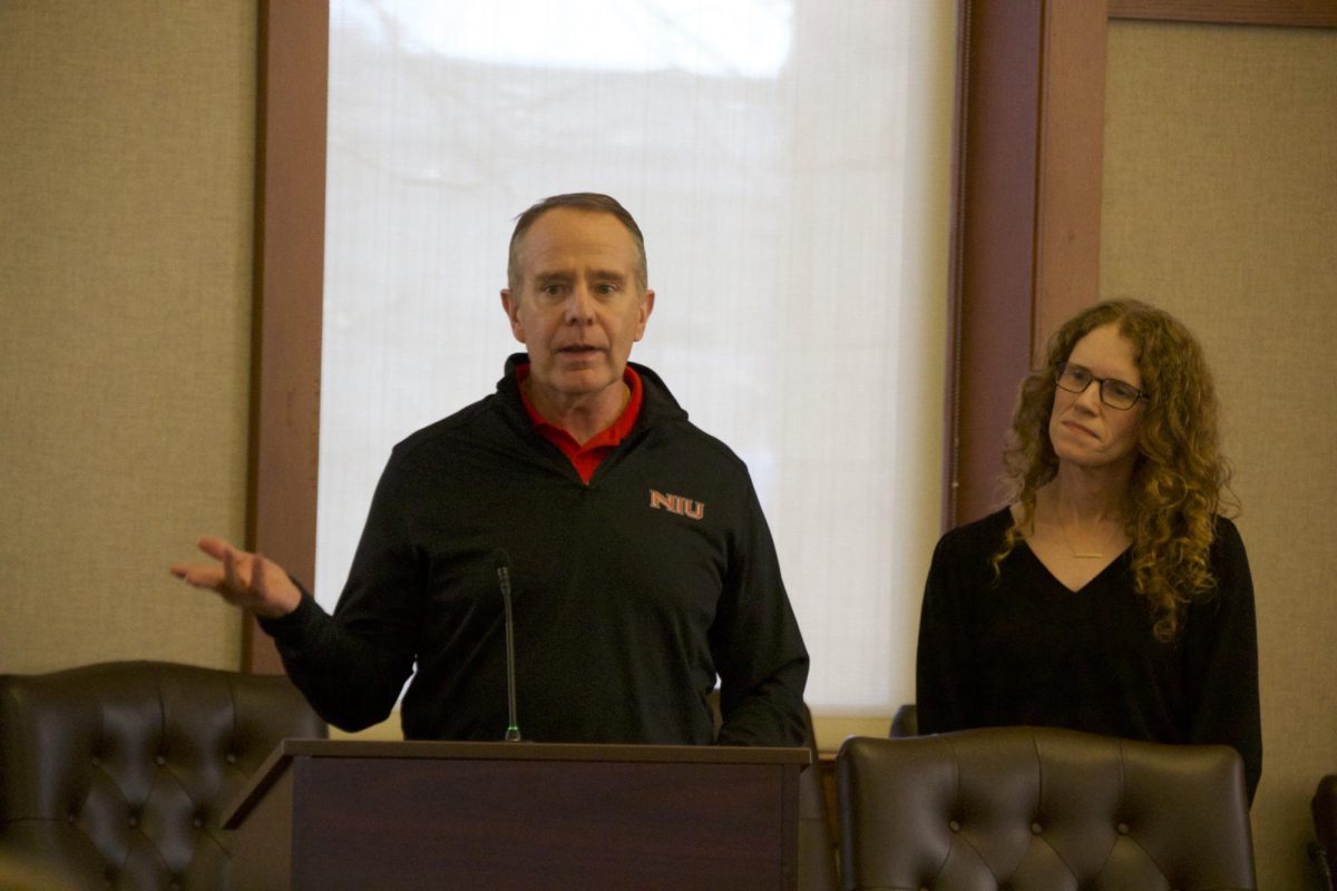 A photo shows Chief Financial Officer George Middlemist speaking at a University Council meeting Wednesday. At the meeting, the council discussed plans to achieve a balanced budget. (Katie Follmer | Northern Star) 