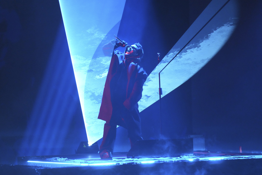 The Weeknd performs a song on stage at the 67th Grammy awards. The Weeknd released his sixth and final studio album Jan. 31 going under the "The Weeknd" persona. (AP Photo/Chris Pizzello)