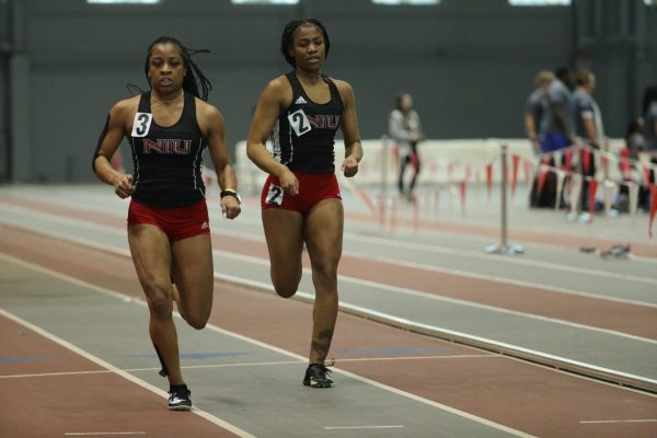 NIU track & field then-sophomore Ari Christian (left) and then-graduate student Aasiyah Barr (right) run at the Redbird Tune-Up last February. After competing at the John Gartland Invitational on Saturday, the Huskies snatched two individual victories and a top-three team finish. (photo courtesy of Illinois State University Athletics)