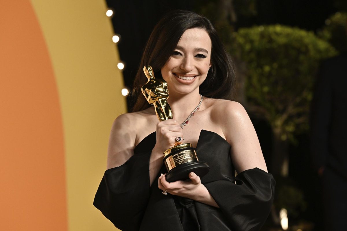 Mikey Madison shows off her Academy Award at the Vanity Fair Oscar Party. Here are some of the biggest moments of the 97th Oscars. (Photo by Evan Agostini/Invision/AP)