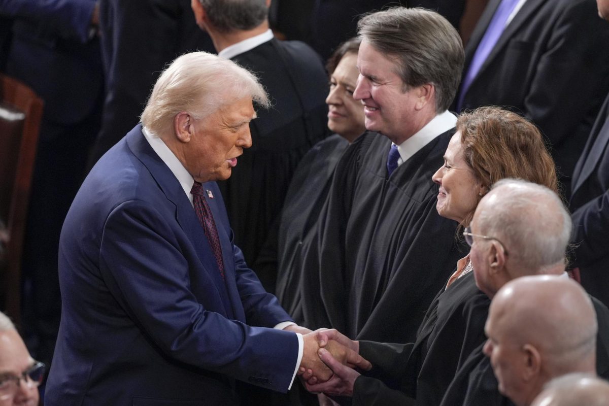 President Donald Trump greets justices of the Supreme Court prior to addressing Congress on Tuesday. Opinion Columnist Nia Jackson believes Trump's immigration policies are harmful and force people to live in fear of what is to come next. (AP Photo/J. Scott Applewhite)