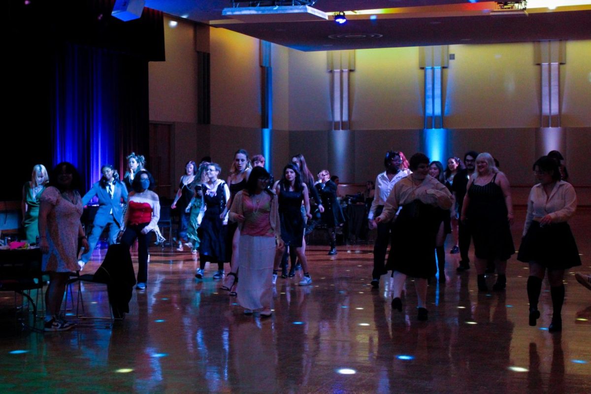 Students laugh as they sync up their dance routines. Queer Prom: Shipwrecked is PRISM’s second Queer Prom, with last year’s being themed “heaven and hell.” (Kahlil Kambui | Northern Star)