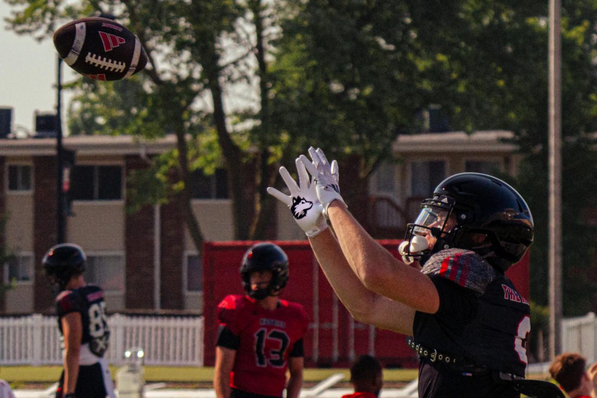 NIU football sophomore wide receiver George Dimopoulos (9) prepares to catch the ball during a NIU football practice. The Northern Star Sports staff shares their predictions for the outcomes of five college football games scheduled to take place this weekend. (Totus Tuus Keely | Northern Star)