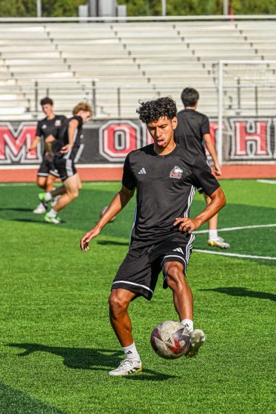 NIU men’s soccer senior midfielder Jose Gomez (10) juggles the ball during practice on Aug. 13. Gomez played 90 minutes and assisted the winning goal in the Huskies' 1-0 victory over the University of Wisconsin-Green Bay. (Totus Tuus Keely | Northern Star).