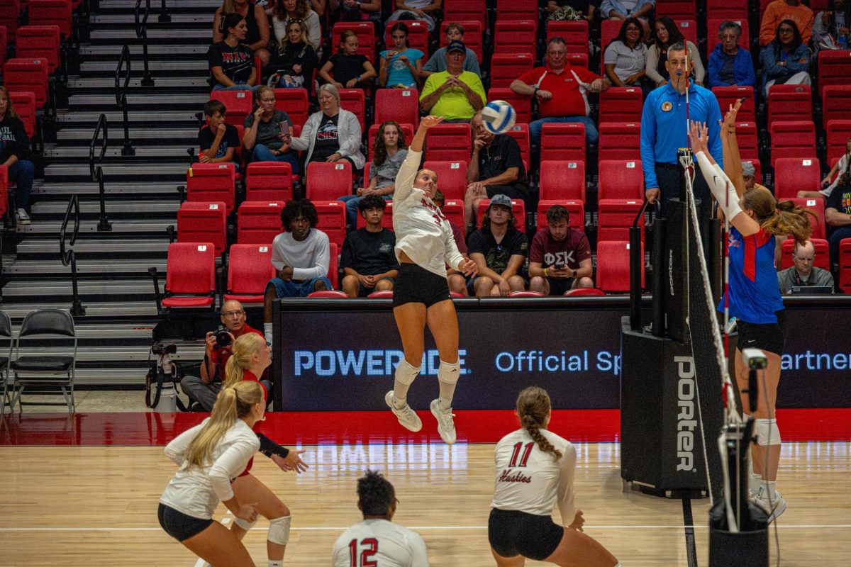 NIU volleyball sophomore outside hitter Ava Grevengoed (3) bumps the ball after it was hit by a DePaul University player during an exhibition match on Aug. 22. Grevengoed was named the tournament MVP after recording three straight double-doubles. (Totus Tuus Keely | Northern Star)