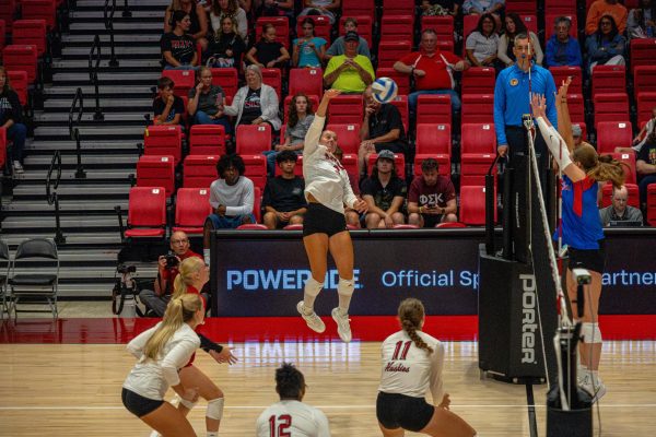 NIU volleyball sophomore outside hitter Ava Grevengoed (3) bumps the ball after it was hit by a DePaul University player during an exhibition match on Aug. 22. Grevengoed was named the tournament MVP after recording three straight double-doubles. (Totus Tuus Keely | Northern Star)