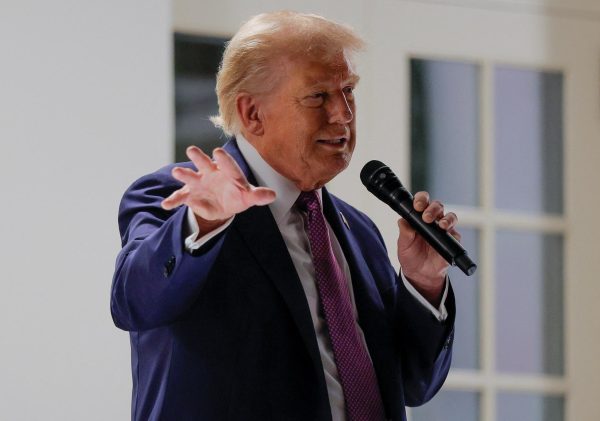 A photo depicts President Donald Trump speaking on Friday during a dinner for lawmakers on the newly renovated Rose Garden patio, at the White House. Opinion Columnist Gabe Santos argues that when death hoaxes of President Trump swarmed the internet, it was met with hope and not mourning. (Reuters | Brian Snyder) 