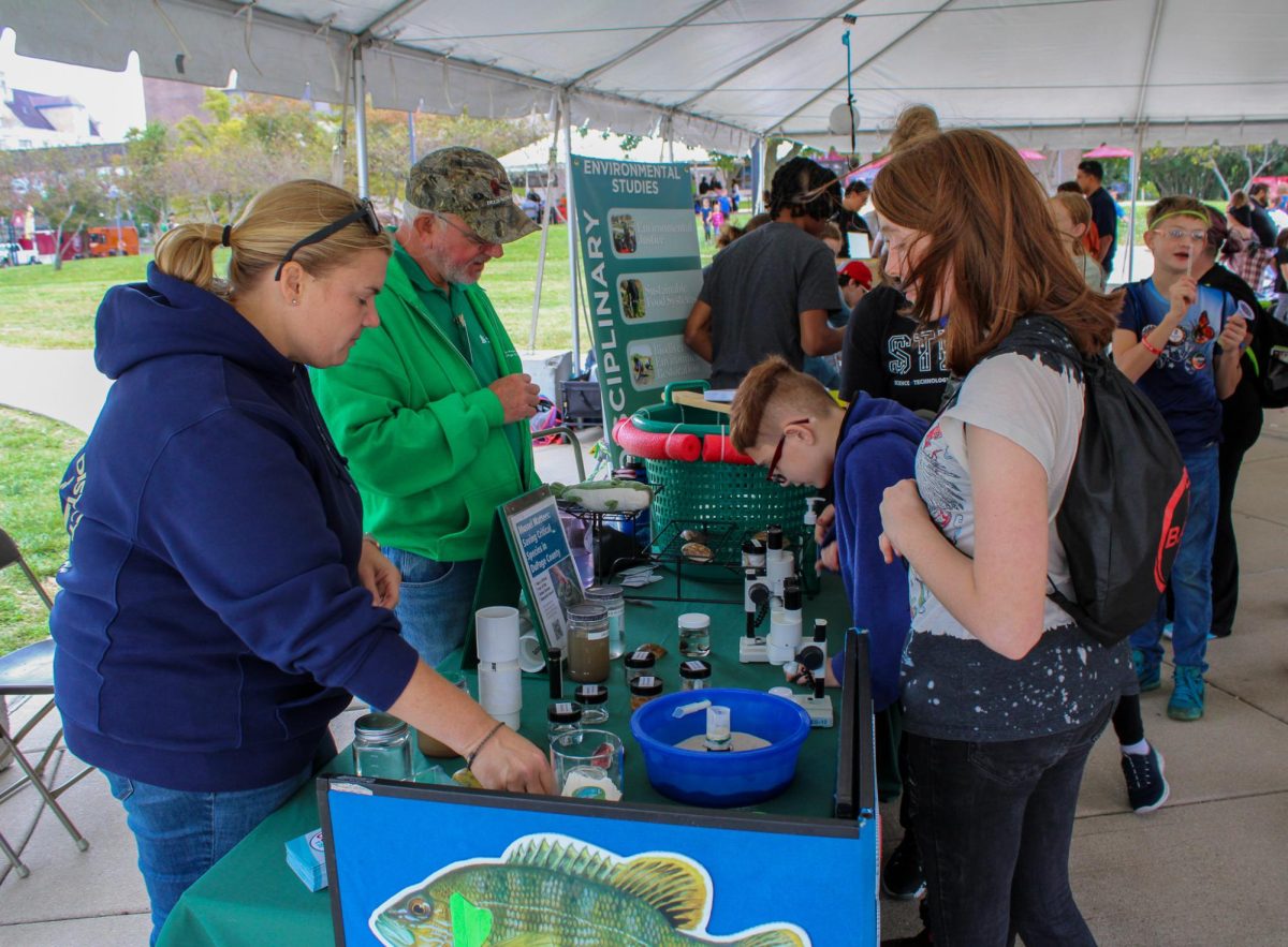 Employees with the Forest Preserve District of DuPage County teach students about species diversity and conservation at STEMFest on Sept. 28, 2024. STEMFest 2025 will be held on Saturday between 10 a.m. and 3 p.m. and will showcase over 100 exhibits and displays. (Ethan Rodriguez | Northern Star)
