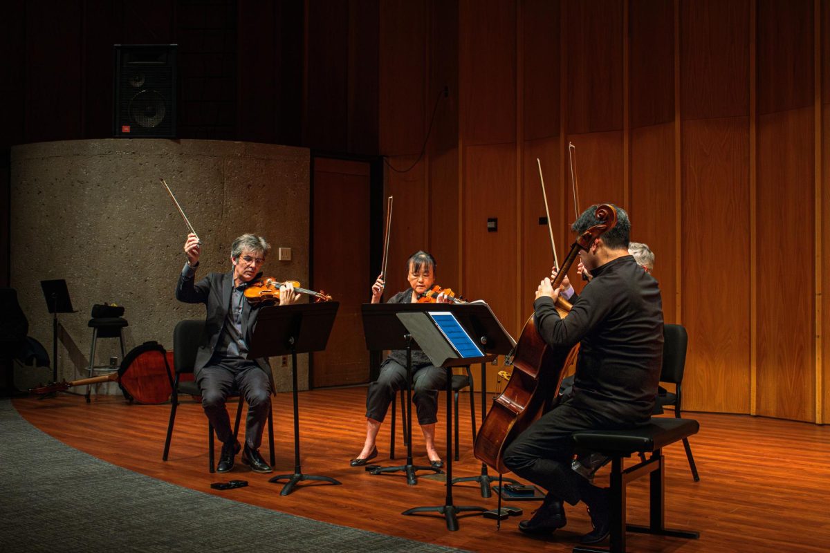 The Avalon String Quartet prepares to strike the final note of “Fellow Traveler (2008)” composed by John Adams, their opening piece on Jan. 30 at the Recital Hall in the Music Building. The quartet will join composer Narongrit Dhamabutra and pianist Winston Choi to perform Dhamabutra's new piece for quintet from 6 p.m. to 7 p.m. on Friday at the Recital Hall in the Music Building. (Totus Tuus Keely | Northern Star)