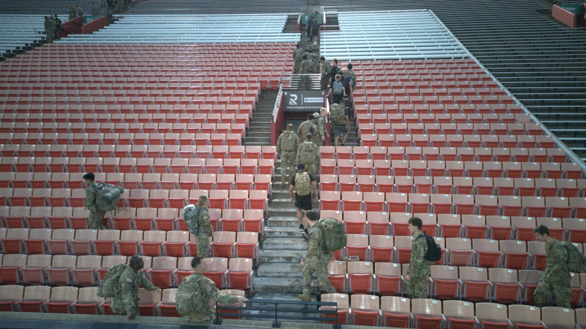 ROTC members ascend and descend the stairs of the bleachers at Huskie Stadium. NIU’s ROTC program commemorated 9/11 firefighters by climbing 220 flights of stairs on Thursday. (Courtesy of NIU ROTC) 