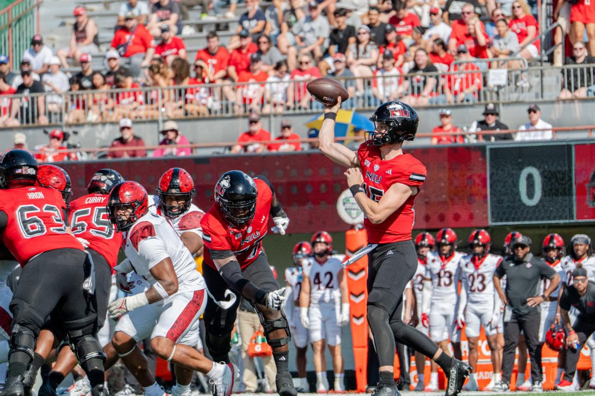 NIU redshirt sophomore quarterback Josh Holst (15) throws a pass during the first quarter of the Huskies' home football game against San Diego State University on Saturday at Huskie Stadium in DeKalb. The Huskies dropped their third-straight game in a 6-3 loss to the Aztecs. (Totus Tuus Keely | Northern Star)
