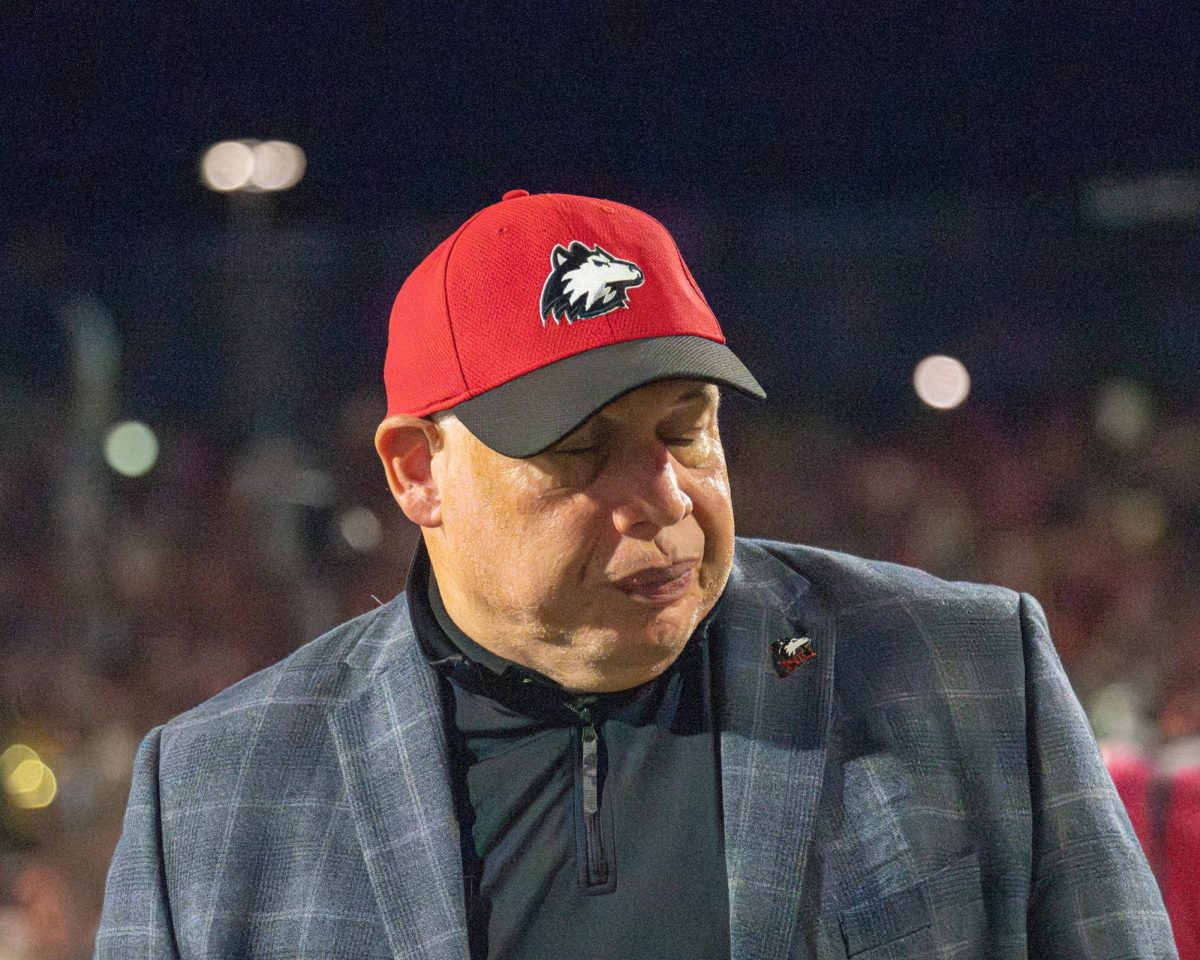NIU Vice President and Director of Athletics and Recreation Sean Frazier looks away with his eyes closed during the first half of NIU football's Friday night matchup against the University of Maryland Terrapins in College Park, Maryland. The Huskies fell short against the Terps, losing by a score of 20-9. (Totus Tuus Keely | Northern Star) 