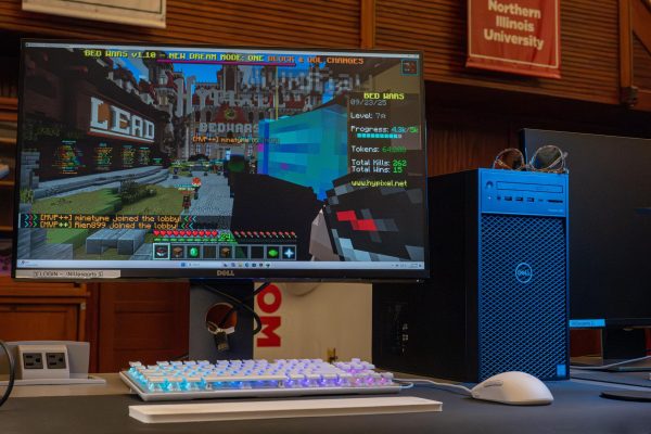 Blue light protection glasses sit on top of a computer in the NIU Esports Arena located in Altgeld Hall 100. Blue light glasses can help reduce eye strain, a potential health issue for gamers. (Totus Tuus Keely | Northern Star)