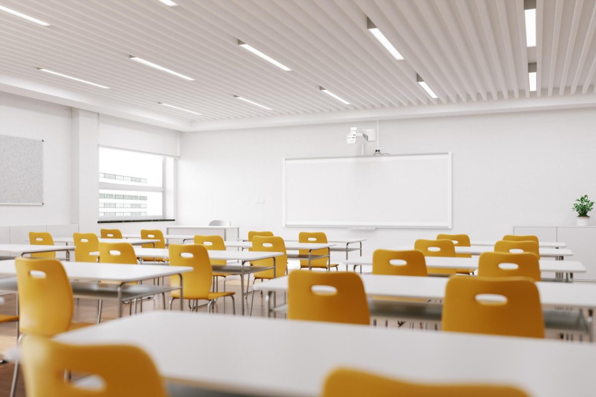 A tidy classroom sits empty. Opinion Columnist Ethan Ernst argues that in order to improve attendance rates in classes, students should be motivated to show up to classes, instead of having attendance be mandatory. (Getty Images)