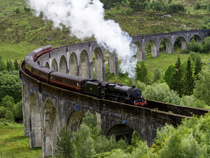 The Hogwarts Express runs through the countryside in of Scotland. Opinion Columnist Gabe Santos believes that "The Hunger Games," "Harry Potter," "The Lord of The Rings," "Game of Thrones," "Maze Runner" and "Percy Jackson" are some of the best live action adaptations. (Getty Images) 
