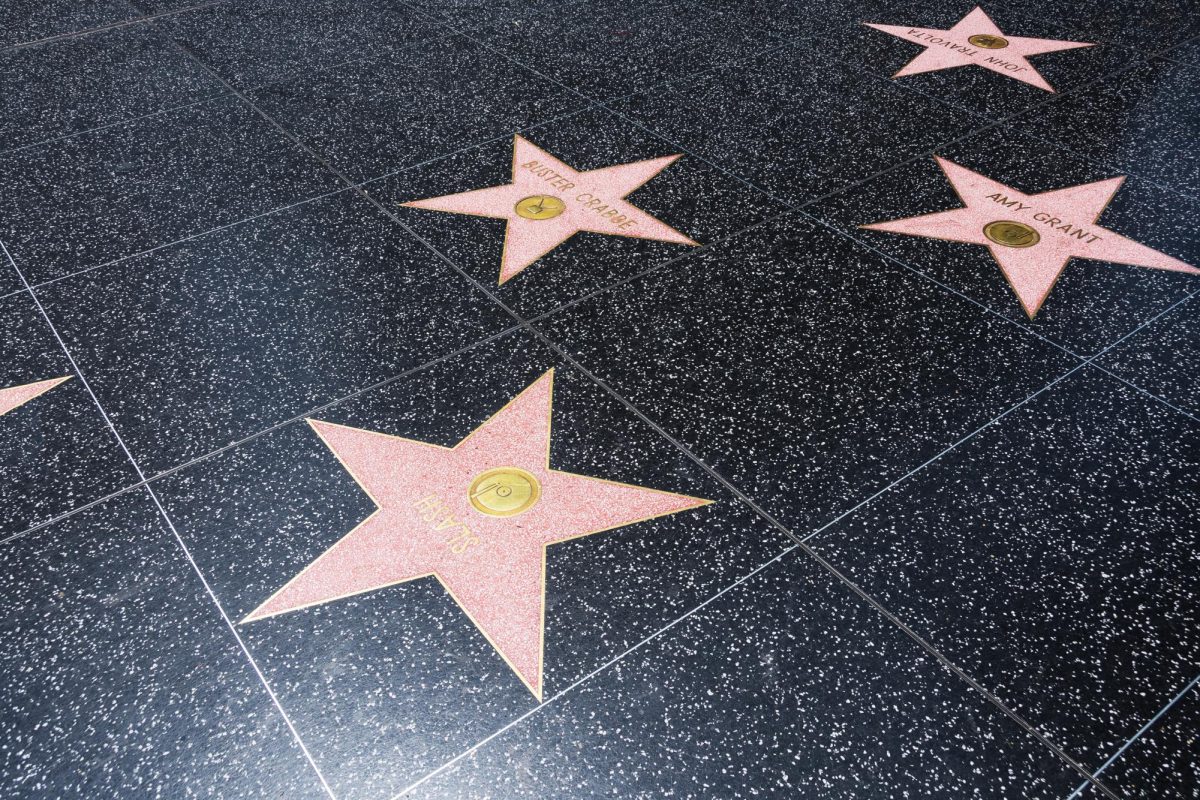 A photo depicts celebrities Walk of Fame stars, such as Amy Grant on Hollywood Boulevard. Assistant Opinion Editor Emily Beebe argues that celebrities should not be held to such high expectations because they are everyday people that make mistakes. (Getty Images)
