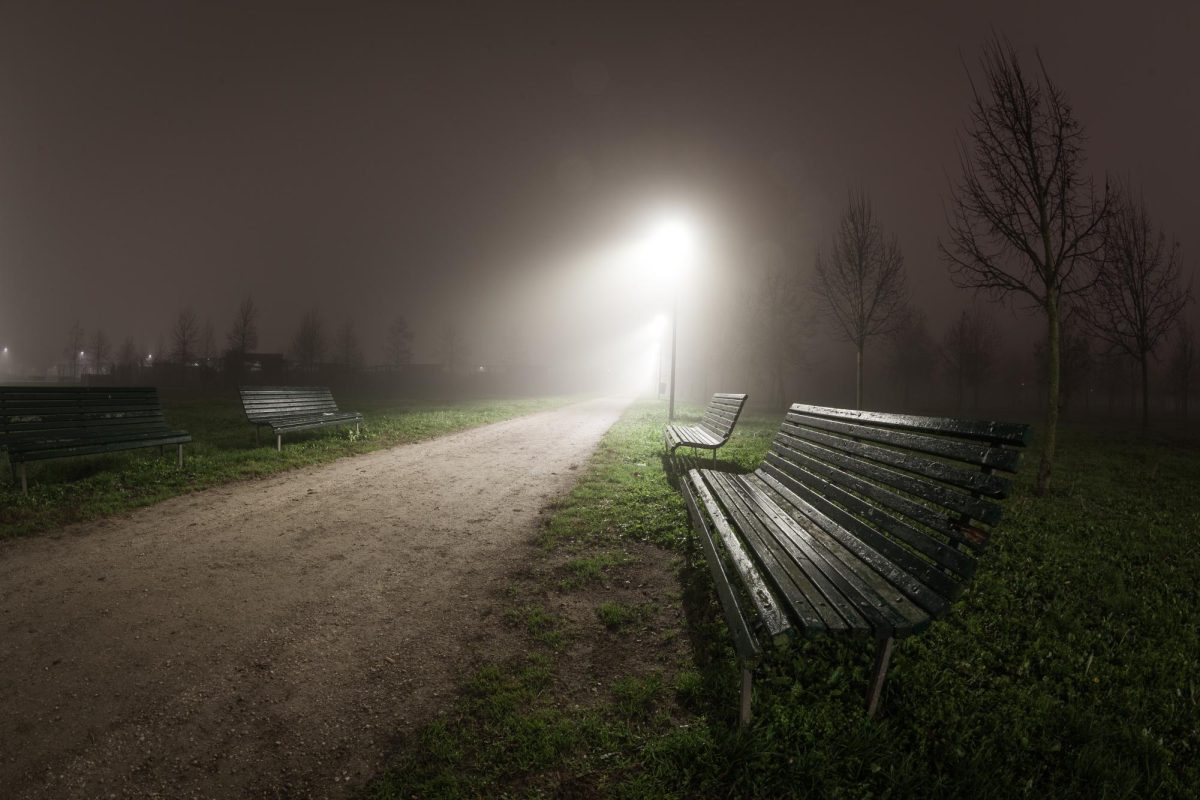 Two park benches are dimly lit on a dark night. "Weapons" is now playing playing in theaters and is also available on YouTube, Apple TV and Fandango at Home. (Getty Images)
