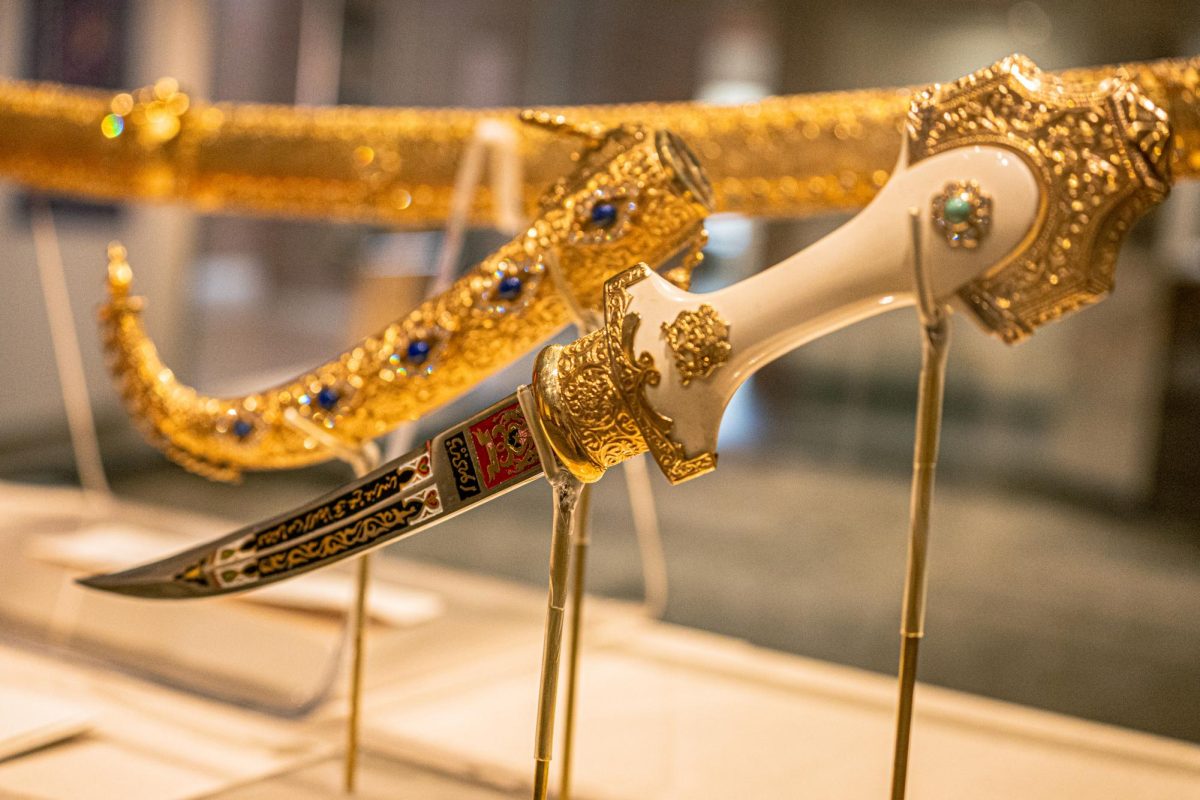 A ceremonial dagger from the Kingdom of Morocco that was received by the Secretary of State Cyrus R. Vance on Dec. 11, 1979, from King Hassan II is on display in the “How We Rebuild” exhibit. This exhibit focuses on the damages done to communities following times of wars and the process of rebuilding. (Totus Tuus Keely | Northern Star)