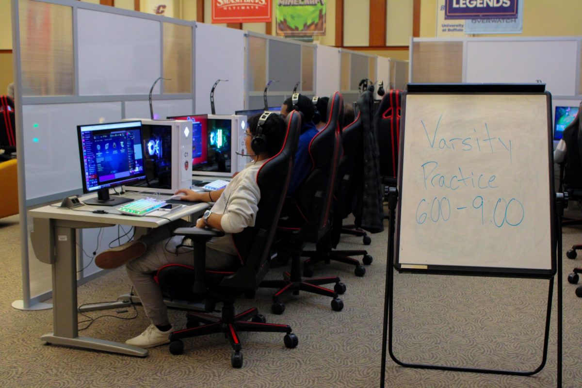 The NIU "League of Legends" varsity team practices the game on Oct. 16 in the Esports Arena. A "Call of Duty" team will be added in the coming months to the Huskie Gaming Club. (Ethan Rodriguez | Northern Star)