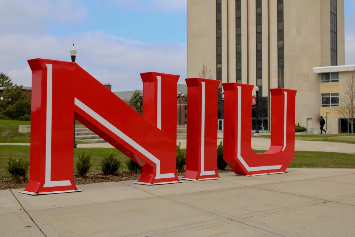 A red NIU sign is pictured in the MLK Commons. Total NIU enrollment rose 4.3% in the 2025 fall semester, with a 22% increase in new freshmen. (Ethan Rodriguez | Northern Star)