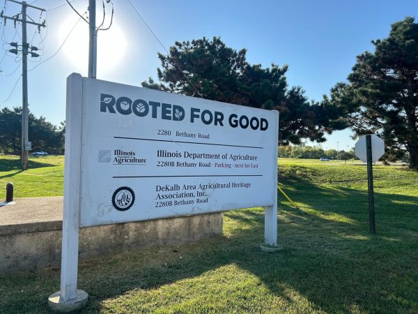 A Rooted for Good sign stands at 2280 Bethany Road in DeKalb. Rooted for Good is a nonprofit organization offering access to healthy and sustainably-sourced foods through its mobile food pantry. (Austin Lamb | Northern Star) 