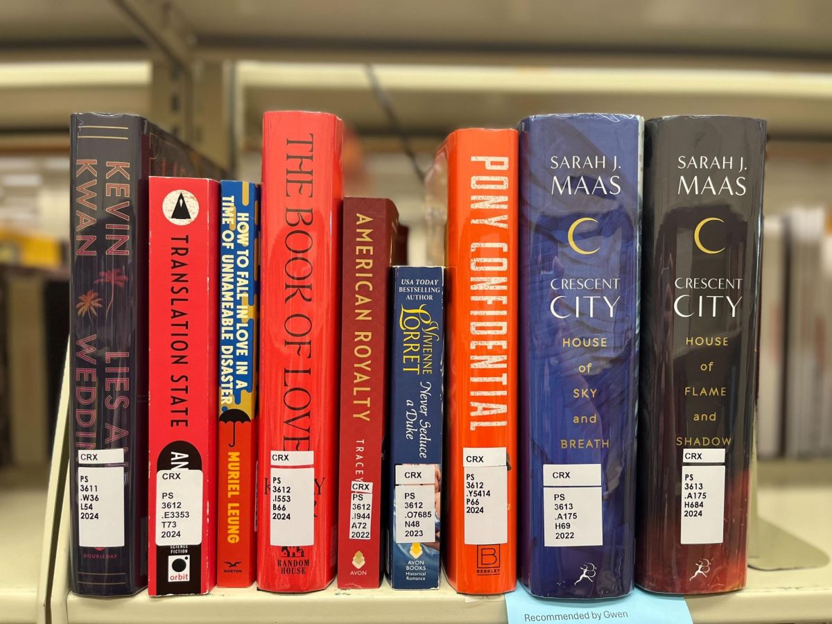 A variety of books sit on a shelf at Founders Memorial Library. Founders Memorial Library offers these titles and more to patrons to check out (Rachael Swinson | Northern Star)