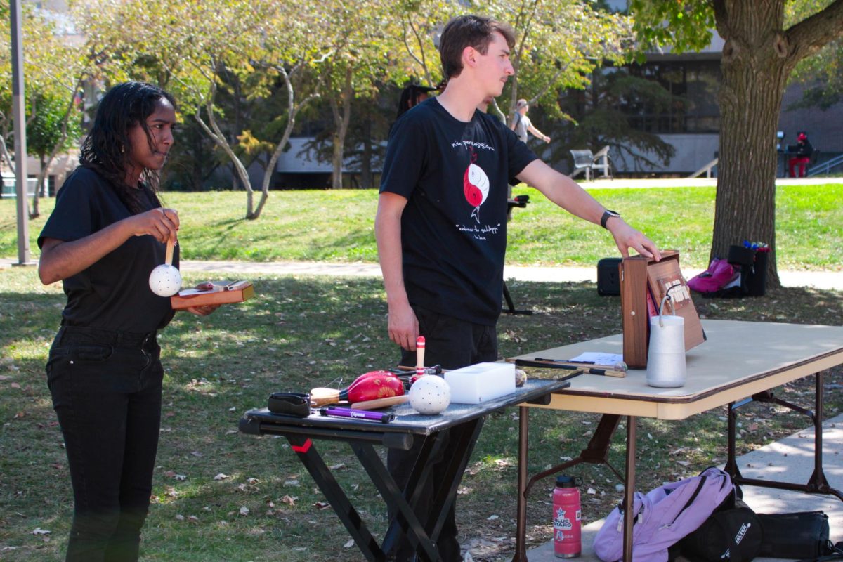 On Monday, Members of the NIU Percussion Band play at the in the MLK Commons at the Sound Garden. Students used instruments such as rain shakers, maracas, gongs, chimes and more to create relaxing sounds. (Grace Kilbreath | Northern Star) 