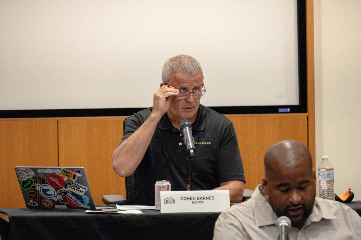 Mayor Cohen Barnes sits at the DeKalb City Council Meeting on Sept. 8. The City Council addressed housing insecurity and homelessness in DeKalb at Monday’s meeting. (Totus Tuus Keely | Northern Star)