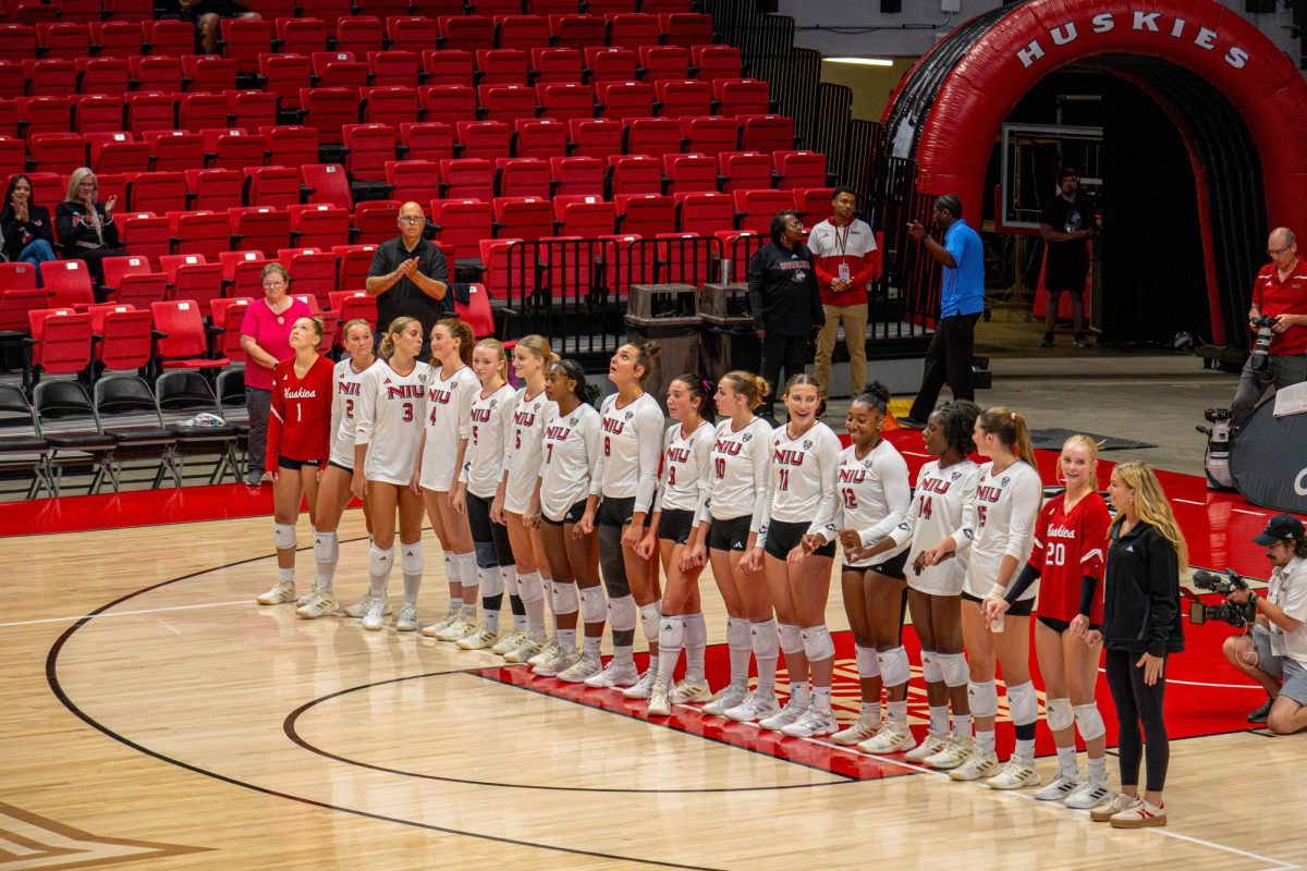 The NIU Volleyball team lines up for an exhibition match against DePaul University on Aug. 22. Sports Reporter Claire Valenti shared her greatest takeaways from the Huskies’ non-conference matches.  (Totus Tuus Keely | Northern Star