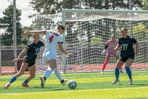 NIU women’s soccer senior forward Kelsi McLaughlin (4) attempts a shot against Eastern Illinois University on Sunday at the NIU Soccer and Track & Field Complex. Sports Reporter Abel Naranjo breaks down his three main takeaways from the beginning of the women’s soccer season. (Totus Tuus Keely | Northern Star)