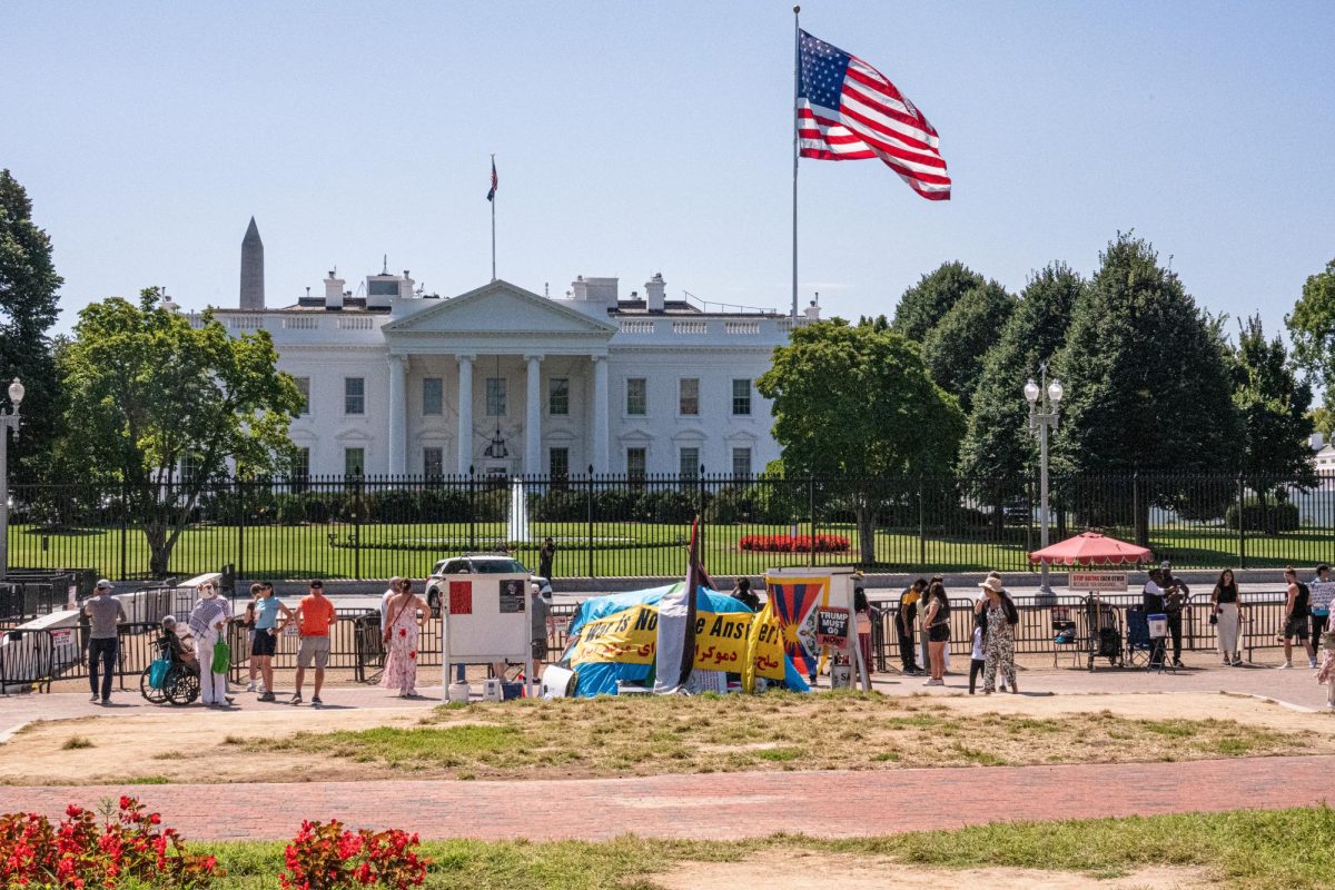 Several protest signs from different organizations are set up on Friday in the south end of Lafayette Square, Washington, D.C., at the edge of fencing on the north end of the White House. Groups such as the White House Peace Vigil and the Truth Conductor had signs promoting less hate in the world. (Totus Tuus Keely | Northern Star)