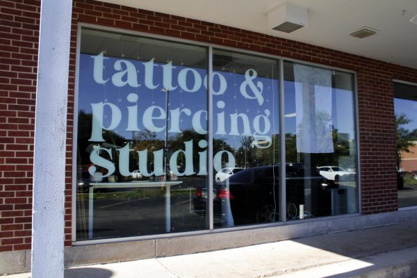 DeKalb Tattoo Company sits at 817 W Lincoln Hwy Suite G. Opinion Columnist Gabriel Santos argues that tattoos and other body modifications should not be seen as a sign of immaturity or bad work ethic. (Grace Kilbreath | Northern Star)