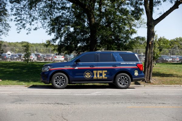 An Immigration and Customs Enforcement (ICE) vehicle sits parked outside the Cook County Courthouse. Federal troops from various agencies were seen in downtown Chicago after the Supreme Court blocked lower court rulings that limited the ability for immigration agents to use race as a factor for detaining individuals. (Reuters | Octavio Jones)
