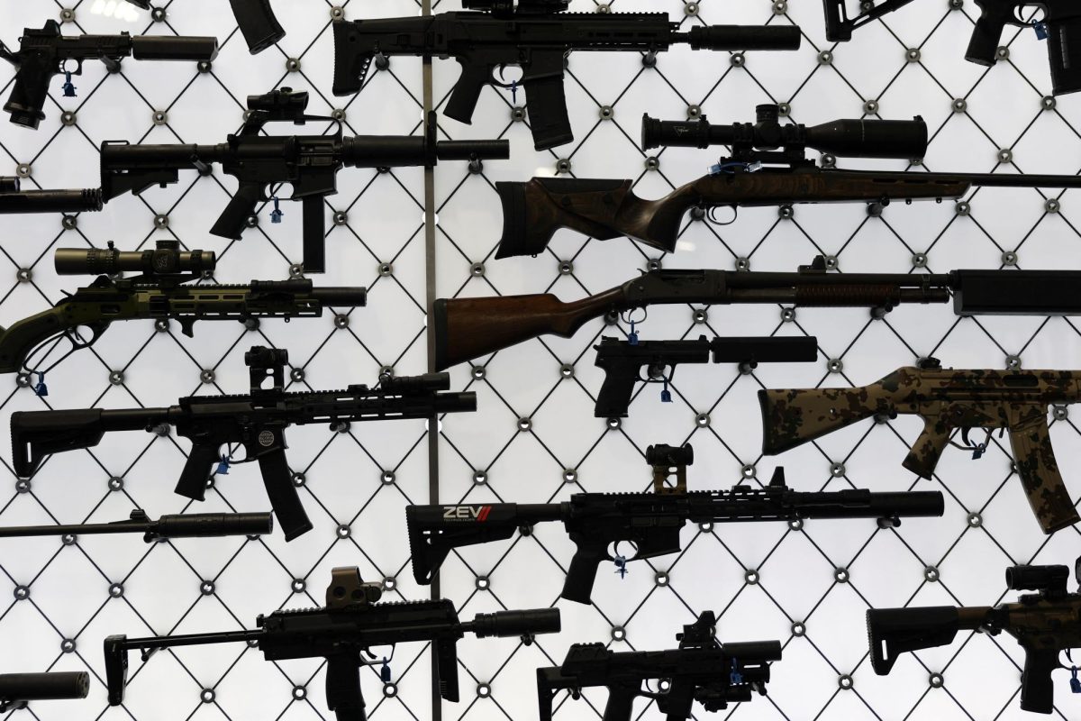 Guns are displayed at a booth during the National Rifle Association's (NRA) annual meeting in Atlanta, Georgia. Opinion Columnist Byrdie Seda argues gun control is the only option to stopping gun violence. (REUTERS | Jeenah Moon)