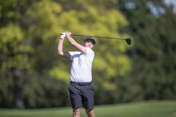 NIU men’s golf redshirt freshman Devin Swoyer follows through during practice at Rich Harvest Farms. Swoyer was named the Mid-American Conference Golfer of the Week after a top-five finish at the Purdue Fall Invitational. (Courtesy of NIU Athletics)
