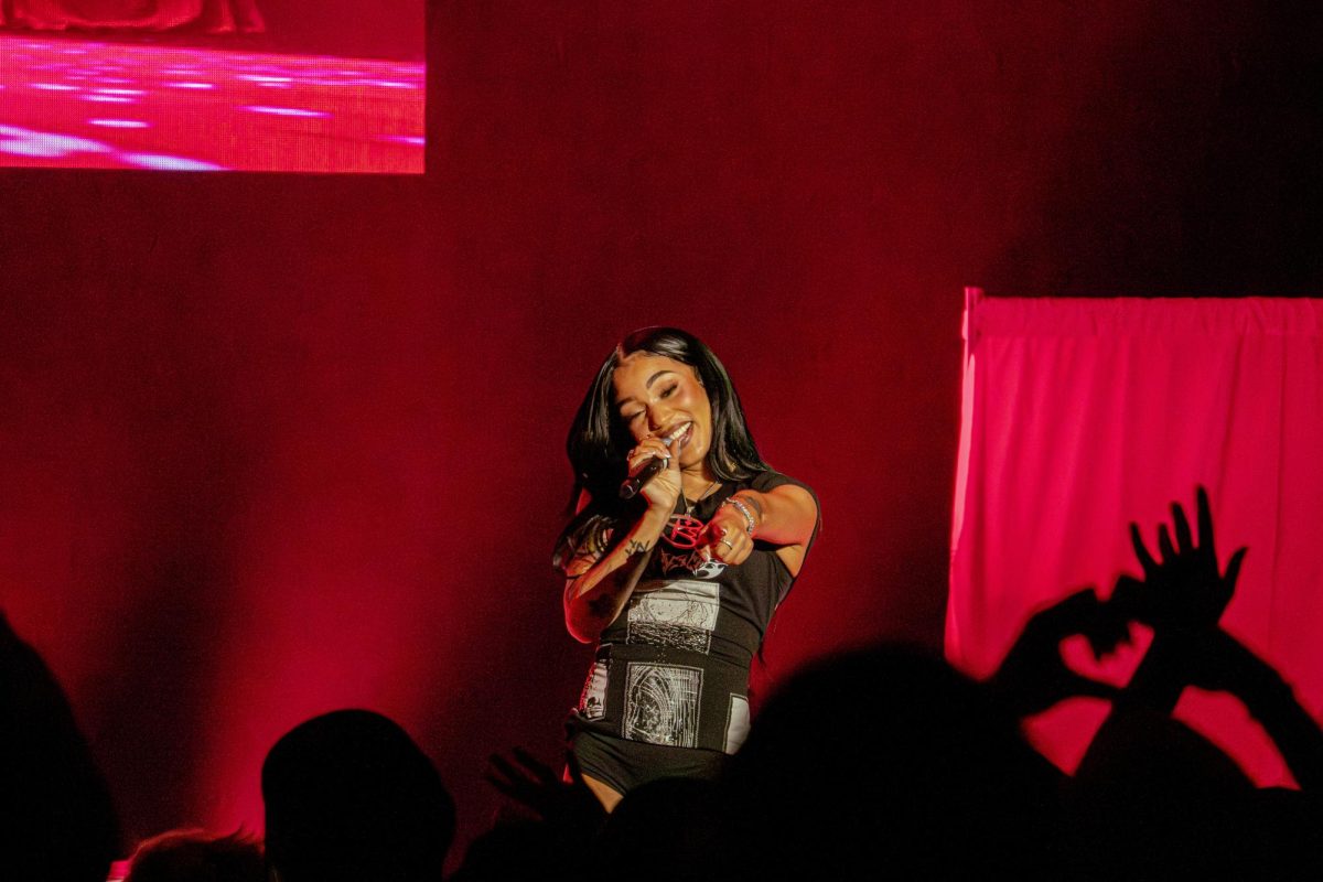 Singer Coi Leray points out people forming hearts with their hands while singing “Self Love” on Thursday at the Egyptian Theatre, 135 North Second St. The Egyptian Theater’s next event is “The Monster Squad” as part of their Horror Film Series at 7 p.m. on Tuesday. (Totus Tuus Keely | Northern Star)