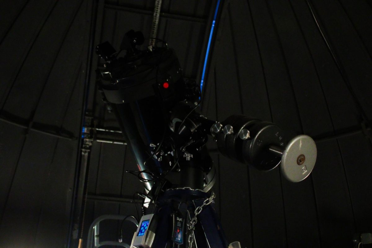 A telescope sits in the Davis Hall Observatory. The telescopes amplify what they’re viewing based on how big an object is, how far away it is and how much light the object emits. (Ethan Rodriguez | Northern Star)