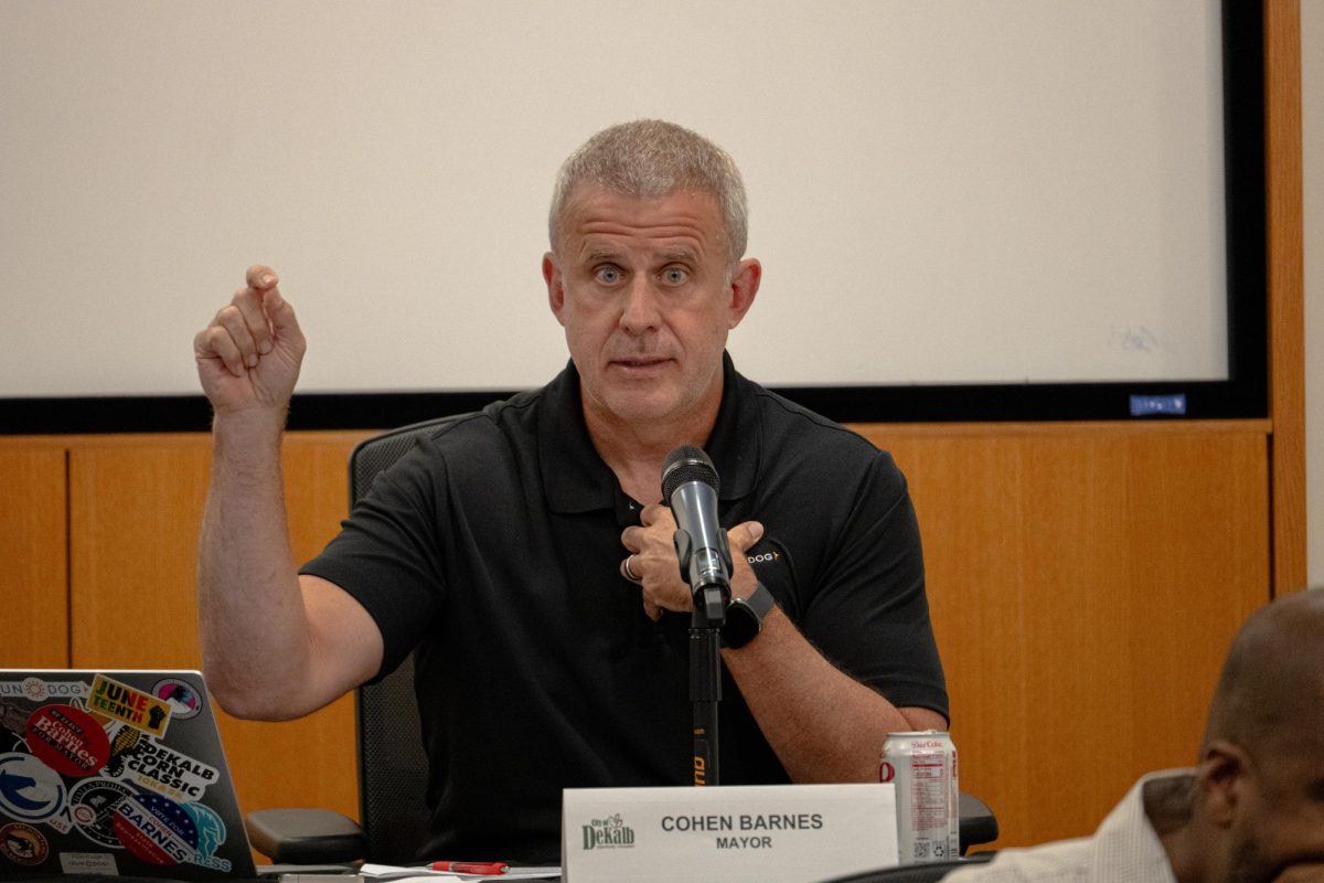 Mayor Cohen Barnes speaks at the City Council meeting on Sept. 8. The City Council discussed infrastructure improvements, public service funding and community recognitions at Monday's meeting. (Northern Star File Photo)