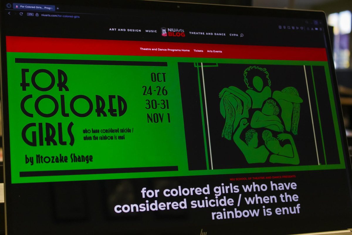 A computer screen shows the title of the School of Theatre and Dance's latest production. "For Colored Girls..." will be performed Friday to Sunday and from Oct. 30 to Nov. 1. (Ethan Rodriguez | Northern Star) 