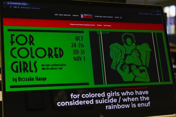 A computer screen shows the title of the School of Theatre and Dance's latest production. "For Colored Girls..." will be performed Friday to Sunday and from Oct. 30 to Nov. 1. (Ethan Rodriguez | Northern Star) 