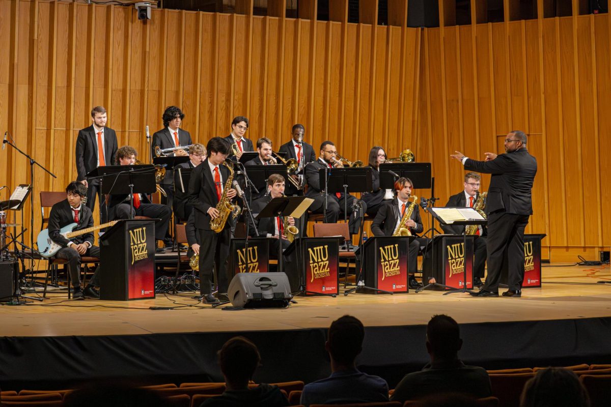 Alto Saxophonist Daisue Kamiuchi solos over the beginning to “Stella by Starlight” composed by Victor Young and arranged by Bill Holman during the Jazz Ensemble and Jazz Orchestra concert on Thursday in the Boutell Memorial Concert Hall in the Music Building. The concert began at 7 p.m. and went on until 8:30 p.m. (Totus Tuus Keely | Northern Star)