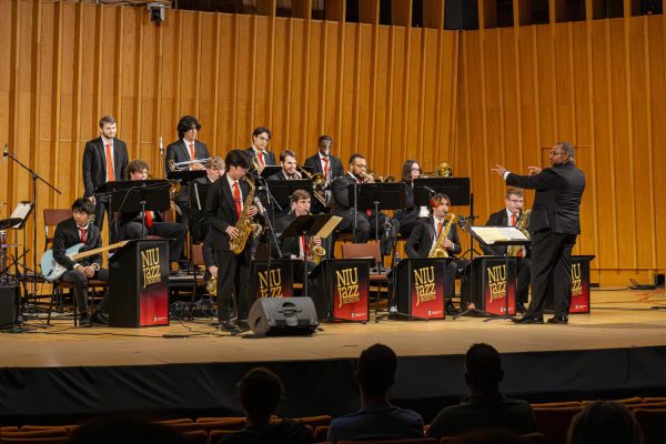 Alto Saxophonist Daisue Kamiuchi solos over the beginning to “Stella by Starlight” composed by Victor Young and arranged by Bill Holman during the Jazz Ensemble and Jazz Orchestra concert on Thursday in the Boutell Memorial Concert Hall in the Music Building. The concert began at 7 p.m. and went on until 8:30 p.m. (Totus Tuus Keely | Northern Star)