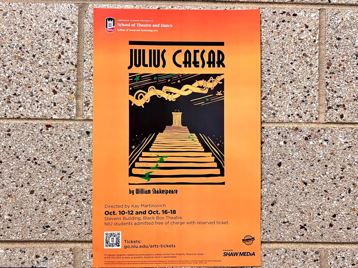 The Julius Caesar poster is displayed on a wall in the Stevens Building. The play had run from Oct. 10 to Oct. 18. (Sofia Howell | Northern Star)