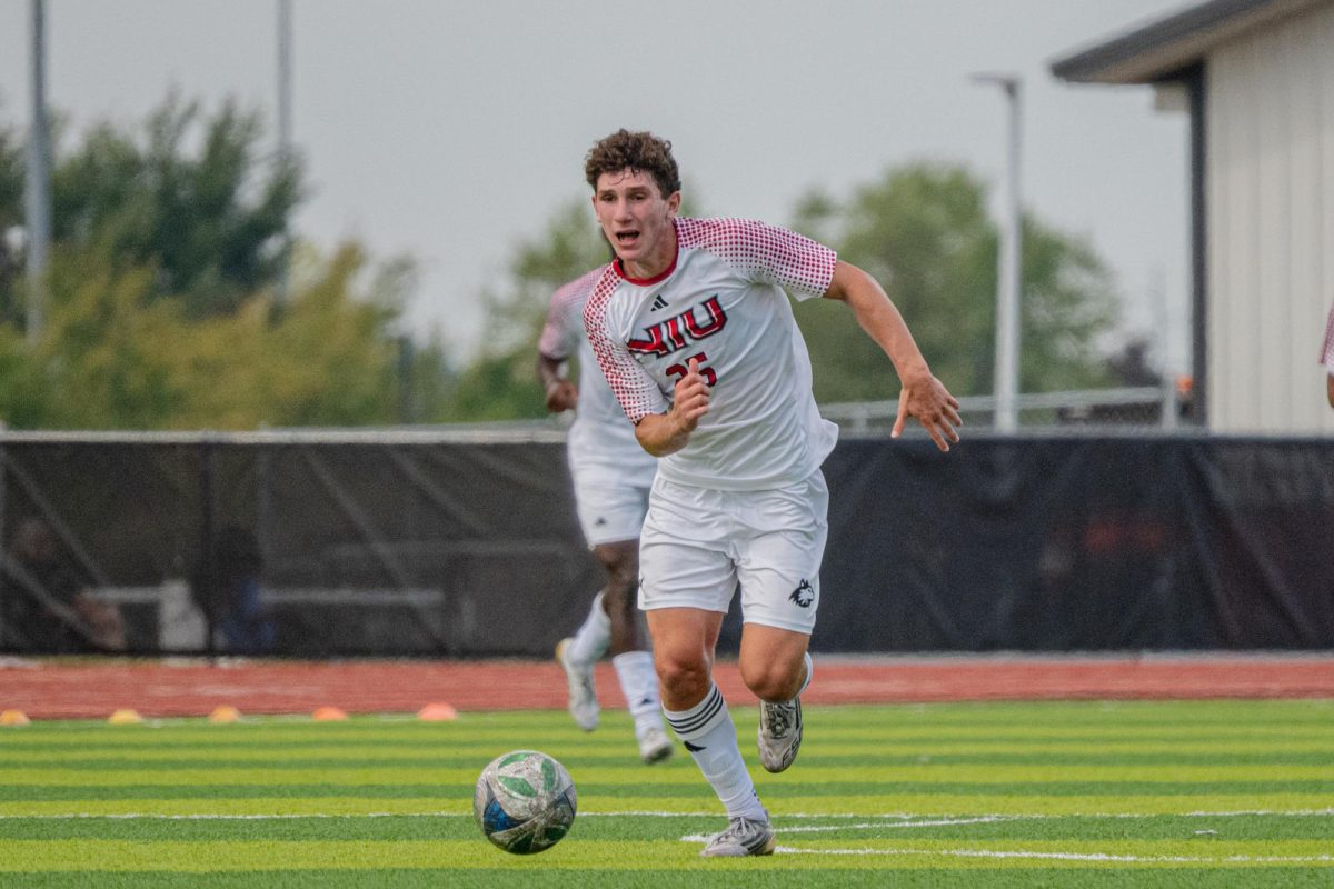 NIU men’s soccer freshman midfielder Niko Ladas (25) drives the ball up the field during the Huskies’ match against Governors State University on Sept. 21. The Huskies were shutout by Western Michigan University on Saturday, with the game ending in a 0-0 draw. (Totus Tuus Keely | Northern Star) 