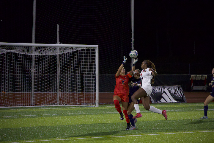 NIU women’s soccer junior forward Tyra King (18) goes for the ball during the Huskies’ match against the University of Akron on Sept. 25. King recorded 4 shots, two of which were on goal, in NIU’s 1-0 loss to Bowling Green State University on Thursday. (Alexia Beck | Northern Star)