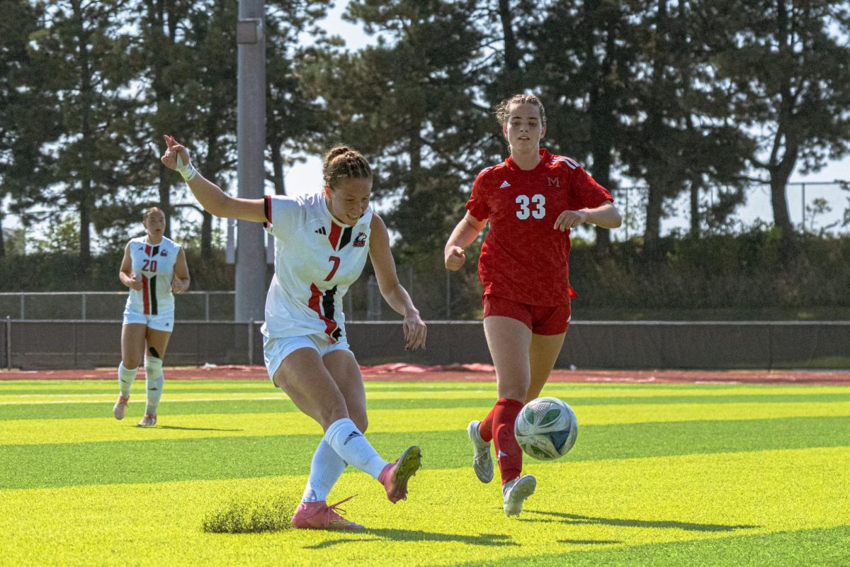 NIU senior defender Aubrey Robertson (7) kicks the ball downfield during the second half of a Sept. 14 match against Miami University at the NIU Track and Field & Soccer Complex in DeKalb. Robertson exited Sunday's 5-0 loss to the University at Buffalo in the 51st minute with an apparent head injury. (Northern Star file photo)