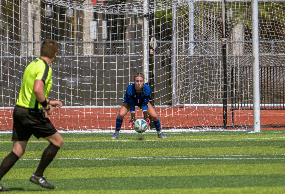 NIU women's soccer sophomore goalkeeper Lauren Pearson(1) receives anshot on goal during the first half of the Huskies' match against Miami University on Sept. 14. Pearson recorded 6 saves in NIU's 1-0 victory over Western Michigan University on Thursday. (Northern Star file photo)