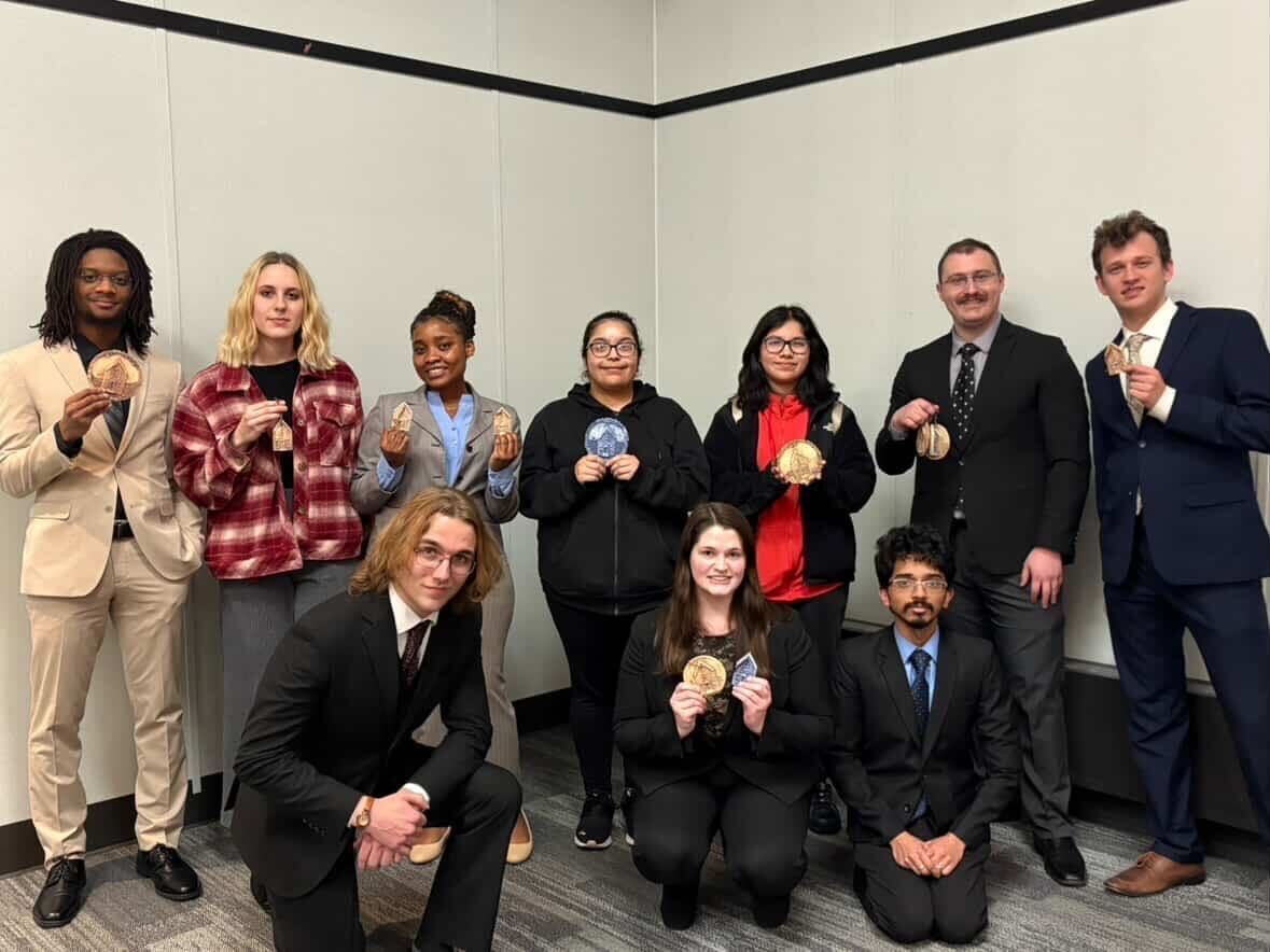 The NIU Forensics Speech and Debate team poses after participating in two tournaments over the weekend. The team left this weekend with a win in Debate sweepstakes and fourth place overall at the Wenzel-Soller tournament in the field of 10 teams. (Courtesy of AJ Evon)
